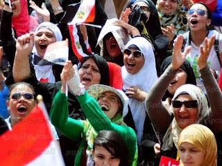 Protesters in Tahrir Square rejoice