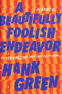 Cover of A Beautifully Foolish Endeavor (orange profiles of what could be human faces appear tiled behind the book's title, which is printed in blue)_