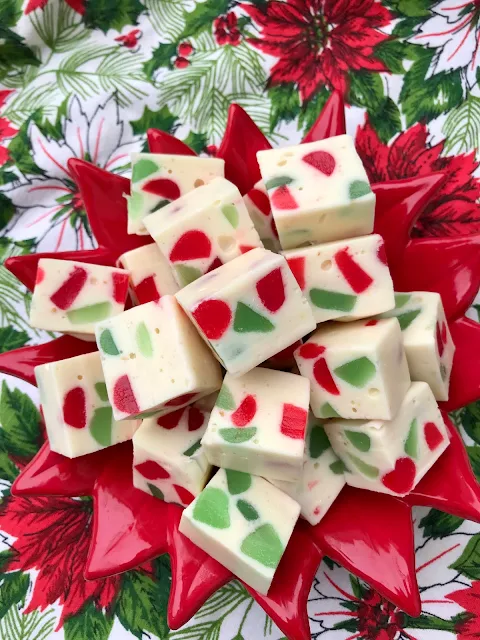 Bowl of Christmas gum drop nougat candy cut into squares.