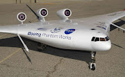 BOEING TO TAKE ON AIRBUS WITH (1000 SEAT) GIANT 797 BLENDED WING 3 ENGINE . (boeing blended wing test model)