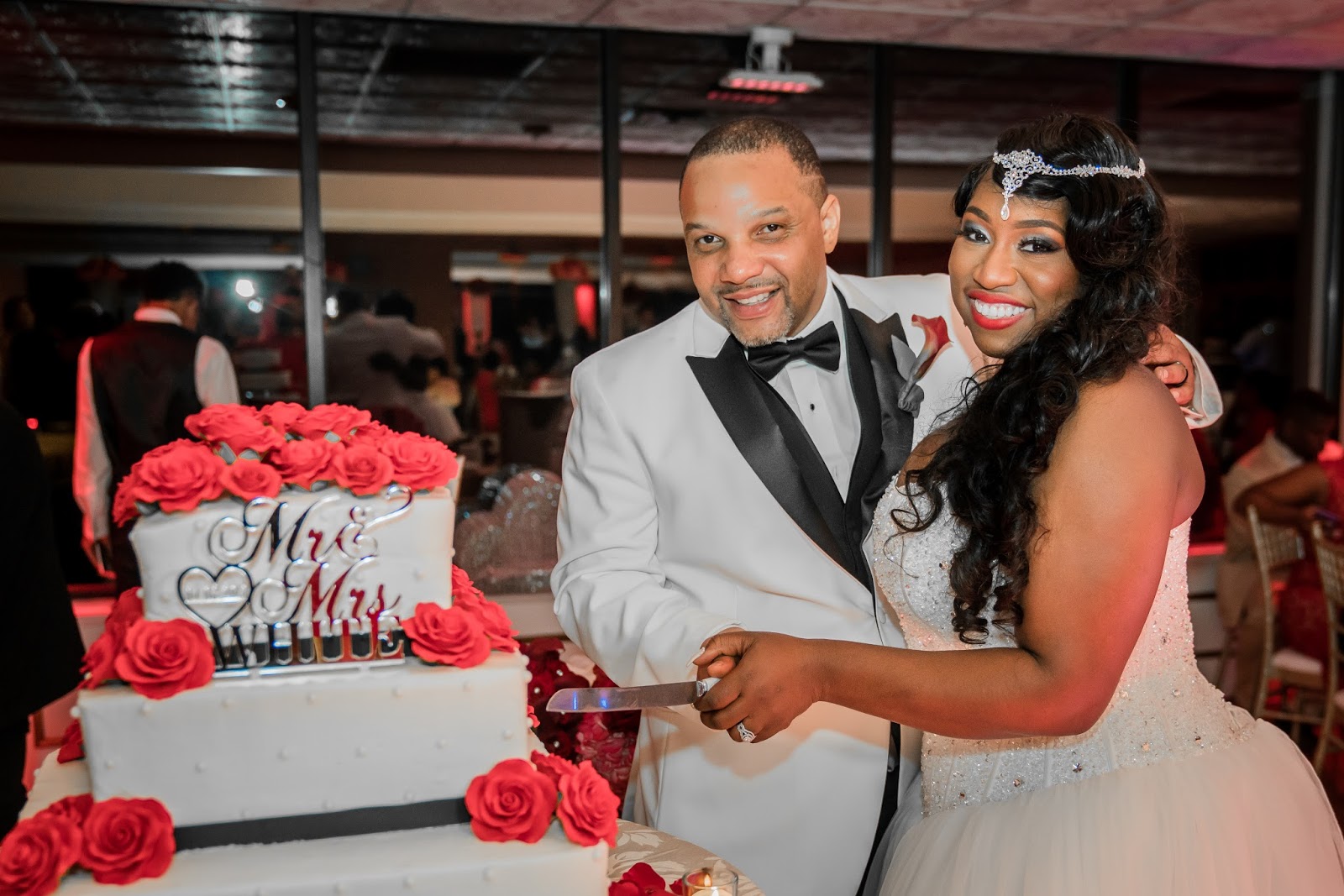 Couple Cutting The Cake