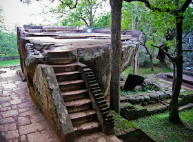 Sigiriya Throne Room, stone throne-sofa, carved entirely from sticking granite rock, ideal smooth and flat ground before the throne