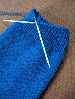 in process knitting of the sleeve cuff ribbing