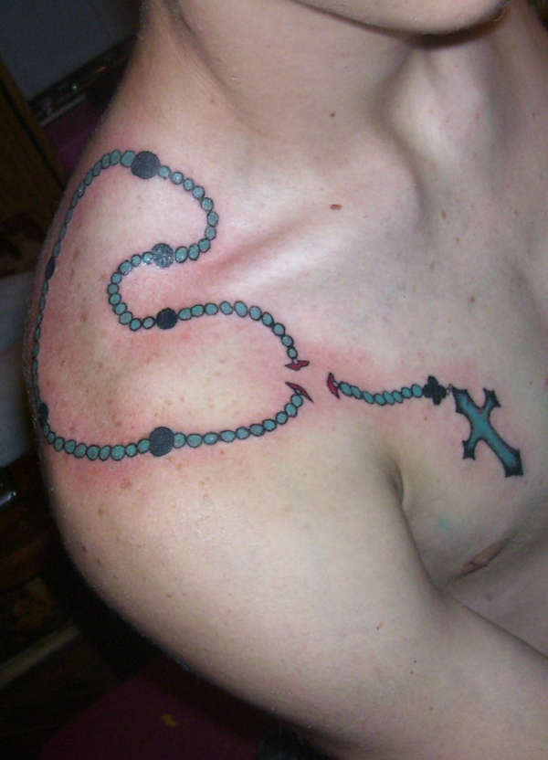 Religious Rosary Tattoos On Chest