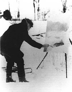 El artista Willard Leroy Metcalf pintando en la nieve