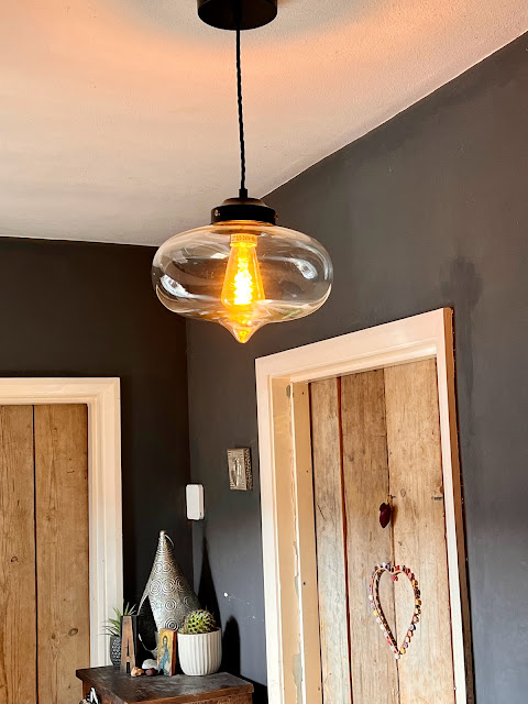 Elisi Goslett clear fish bowl pendant light