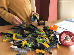 Child taking part in a Lego building challenge