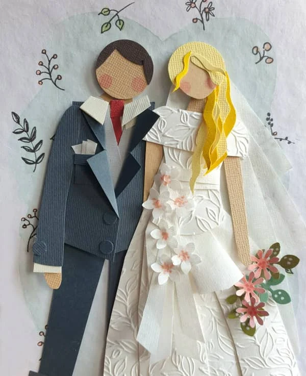 papercut wedding couple made of decorative papers