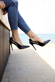 woman with black high heels
