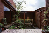 Japanese Wood-Clad House Design With Multi-Level Decks