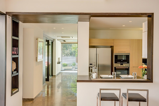 Picture of hallway and modern kitchen with corner bar