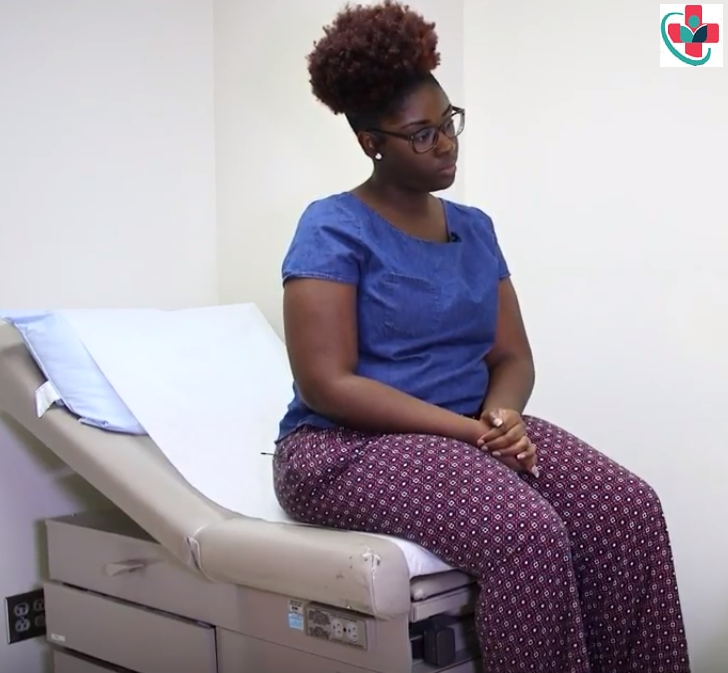 Black woman waiting for a checkup