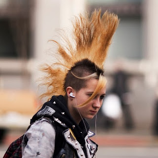 Punk hairstyles are bizarre and colorful. A Mohawk hairstyle is popular with