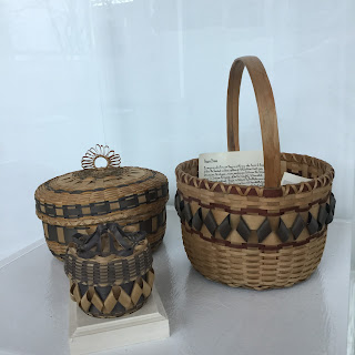 Three baskets made of splints from the Black Ash tree. Some strips are colored a deep brown and a soft black. Image courtesy of the Newark Earthworks Center, The Ohio State University.