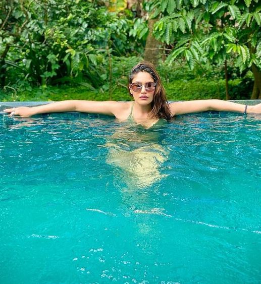 Naagin 5 star Surbhi Chandna gets the temperature soaring as she turns into a water baby