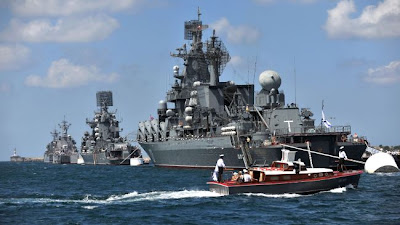 Russian Black fleet ships take part in a Russian military Navy Day parade near an important navy base in the Ukrainian town of Sevastopol, on July 31, 2011.