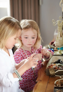 children playing with fashion jewellery