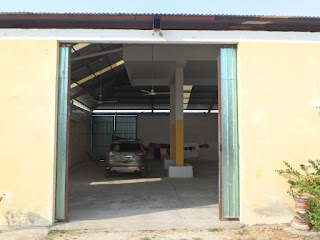 Barn like structure to park vehicles in secure area.