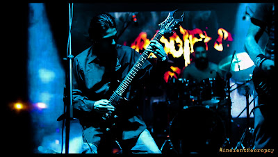 Band:Ancient-Necropsy; Country: Colombia; IvancientJ Playing bc rich guitar, David montoya drummer, Live photo, blue, orange, black, Grupos de Heavy Metal de Colombia