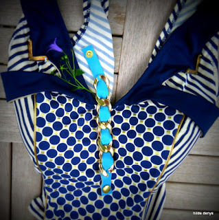 LoveLea's chain with cerulean leather bracelet styled to a swim suit