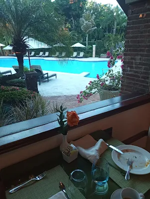 " View of the pool during breakfast in El Embajador a royal hideaway hotel in the Dominican Republic"