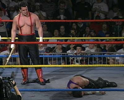ECW November to Remember 94 - Tommy Dreamer stands over a fallenTommy Cairo