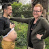 What! Gay dads are pregnant with their first biological child? (See photo)