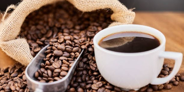 How does caffeine in coffee lower cholesterol?