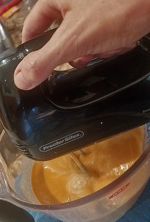 this is a batter for pumpkin roll with it being beaten with an electric mixer