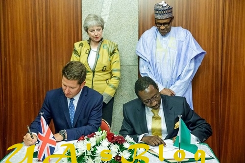 British PM, Theresa May Rocks Locally Made 'Akwete Cloth' From Abia State During Visit To Nigeria (Photos)