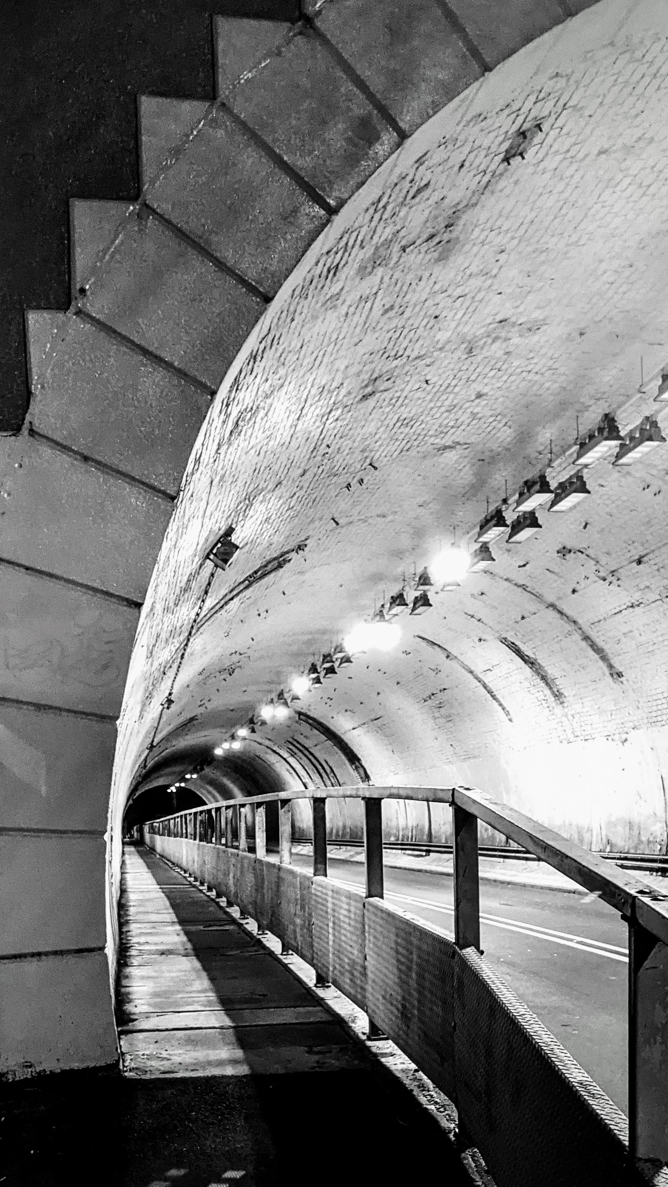 Black and white photo of Seatoun Tunnel at night