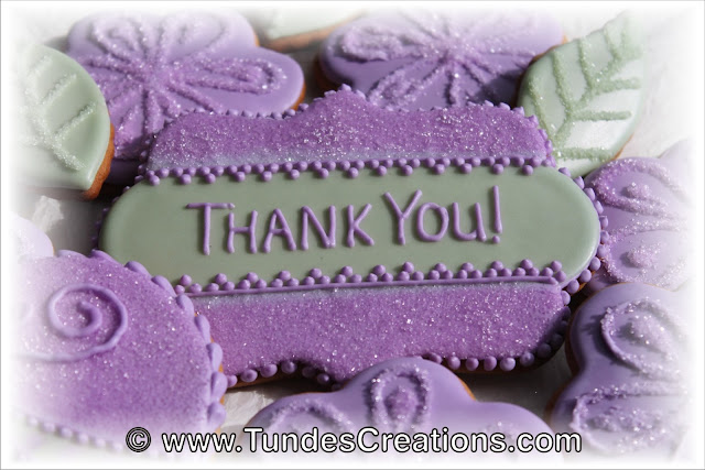 Purple flower "thank you" cookie by Tunde Dugantsi