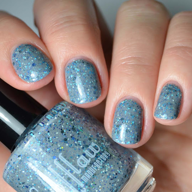 grey nail polish with glitter swatch