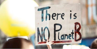 There is no Planet B' written on a sign