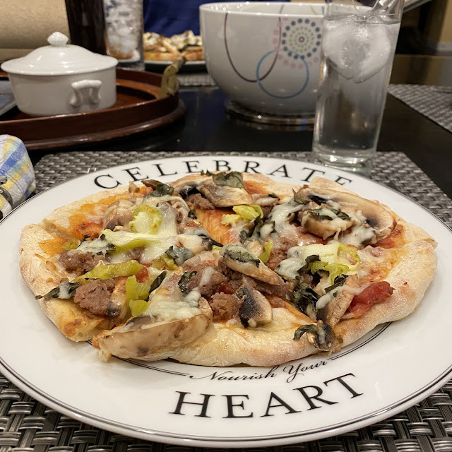 Finished Homemade Pizza on Celebrate Portion Control Dinner Plate Pattern