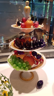 Fruit platters in glass stacked on top of each other