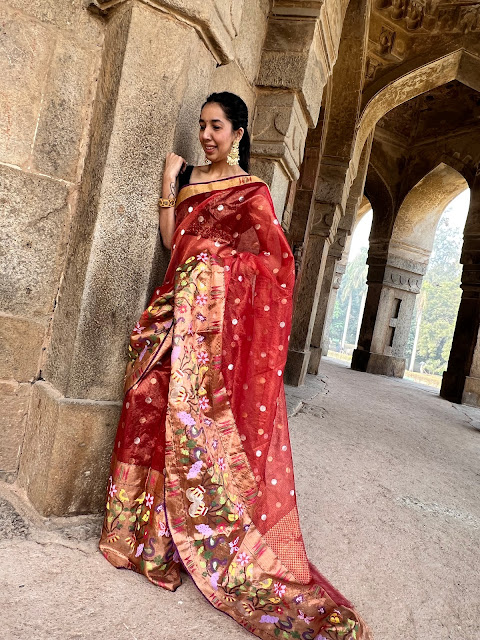 Double tissue kota doria saree with polka dots and jungle themed motifs