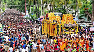 Devotees participating in the 32-km Giri Pradakshina at Simhachalam Temple in Vizag on July 9, 2025