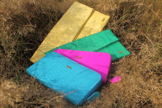 Selection of colourful Melville Purses and Clutch Bags