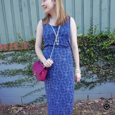 awayfromblue Instagram | blue printed maxi dress with magenta pink crossbody edie bag and pearl necklace bracelet stack spring playdate outfit