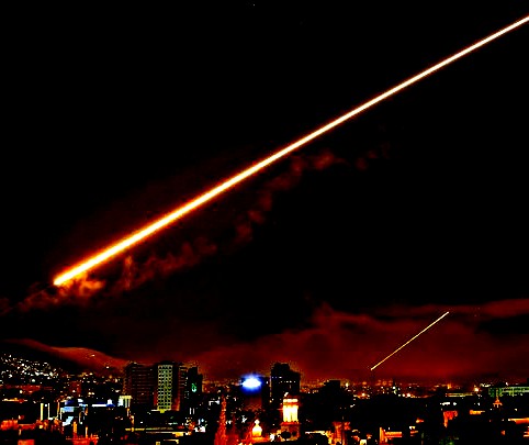 Damascus skies erupt with surface to air missile fire as the U.S. launches an attack on Syria targeting different parts of the Syrian capital Damascus, Syria, April 14, 2018