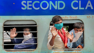 Migrants taking trains during COVID-19 in India