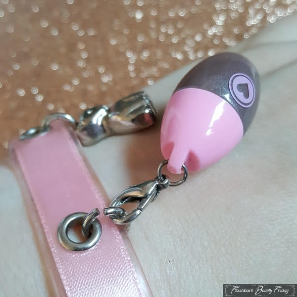 wearing Hard Candy lipgloss bracelet in pink