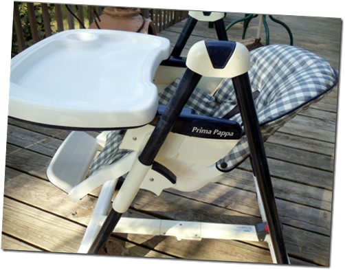 high chair in lower and  slanted new born position