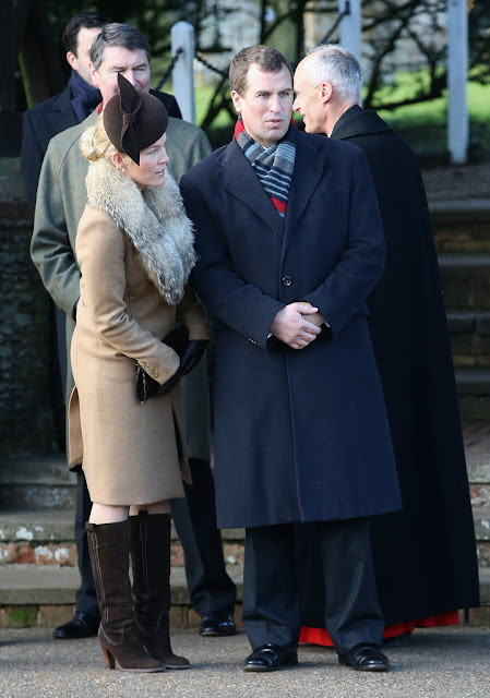 Britain's Prince William, Duke of Cambridge, and his wife Catherine, Duchess of Cambridge, leave after attending with other members of the royal family the traditional Christmas Day Church Service at Sandringham in eastern England, on Dec. 25, 2014.