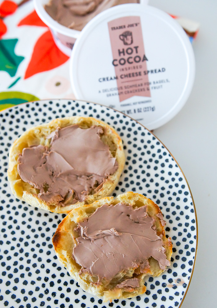 Trader Joe's Hot Cocoa Cream Cheese Spread, spread on english muffins on polka dot plate