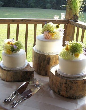 OnceWed has a fabulous DIY post on how to make a similar rustic cake stand