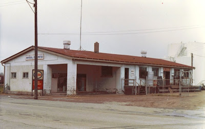 The Esso dealership east of Third St was located next to Shell and 