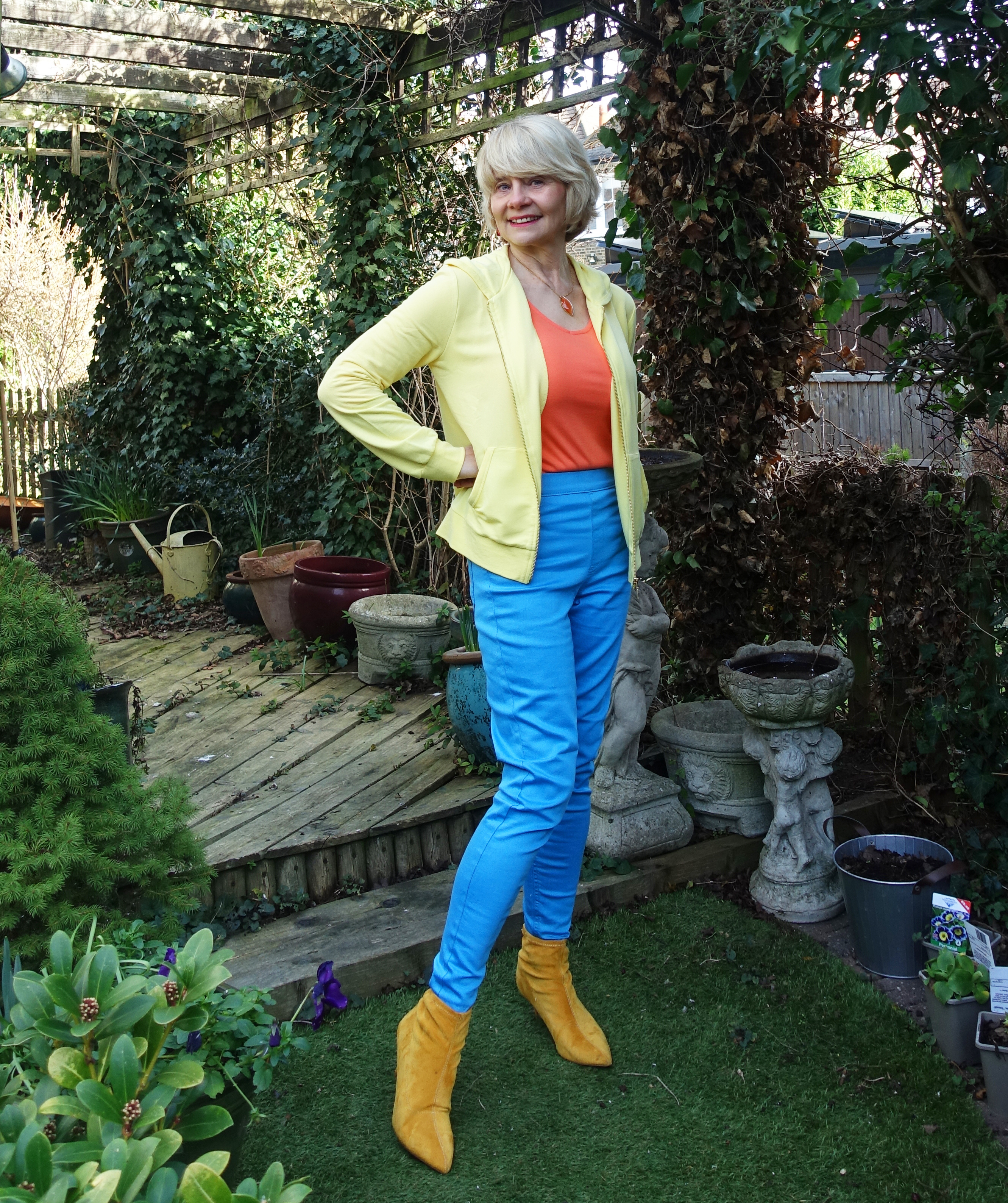 How to wear bright colours over 50.  Gail Hanlon from Is This Mutton in orange, yellow and turquoise