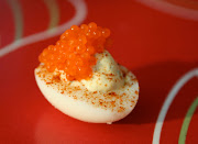 The beauty and splendor of a deviled quail egg, topped with caviar. (deviled quail egg steve schul cocktail buzz)